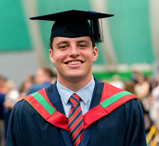 Student smiling on graduation day